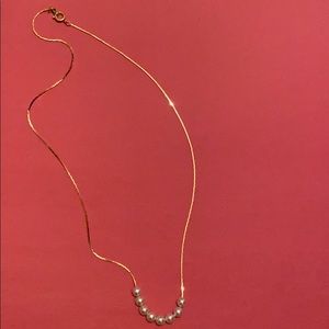 Gold pearl necklace